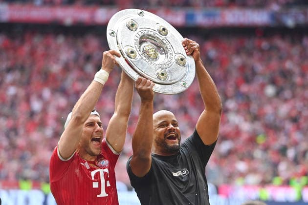 Coach Vincent KOMPANY Bayern Muenchen and Leon GORETZKA Bayern Muenchen with the Meisterschale,Schale,Pokal,Cup,Trophaee Fußball 1 Bundesliga Saison 2025 2026, 34 Spieltag, Spieltag34 FC Bayern Muenchen 1 FC Koeln 5 1 am 16 05 2026 , A L L I A N Z A R E N A