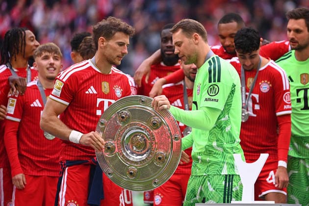 Manuel NEW goalkeeper Bayern Muenchen , gives Leon GORETZKA Bayern Muenchen the Meisterschale,Schale,Pokal,Cup,Trophaee at the award ceremony Football 1 Bundesliga Season 2025 2026, 34 Matchday, Matchday34 FC Bayern Muenchen 1 FC Koeln 5 1 on 16 05 2026 , A L L I A N Z A R E N A
