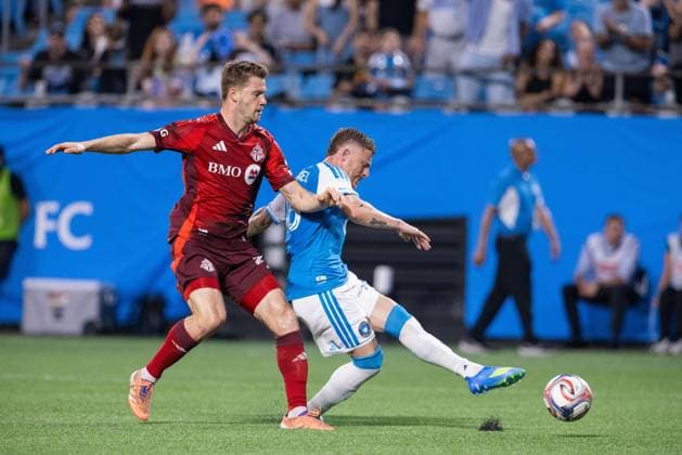 May 16, 2026: Toronto FC defender Walker Zimmerman (25) defends the shot from Charlotte FC midfielder Pep Biel (16) during the first half of the Major League Soccer match up at Bank of America Stadium in Charlotte, NC. ( CSM) MLS, Fussball Herren, USA 2026: Toronto FC At Charlotte FC May 16  - ZUMAc04_ 20260516_zma_c04_003 Copyright: xScottxKinserx