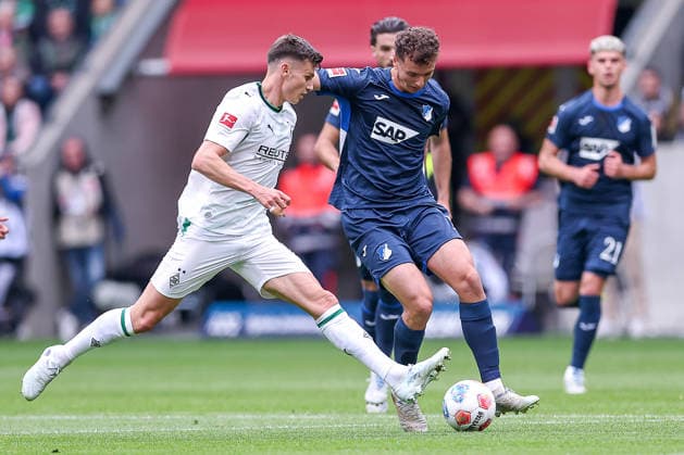 16 05 2026, Football, Borussia Mönchengladbach TSG 1899 Hoffenheim, 1 Soccer Bundesliga, Matchday 34, Borussia Park, Season 2025 2026 Yannik Engelhardt Borussia Mönchengladbach 06 in duel against Fisnik Asllani TSG Hoffenheim 11 DFB regulations prohibit any use of photographs as image sequences and or quasi video Nordrhein Westfalen Germany