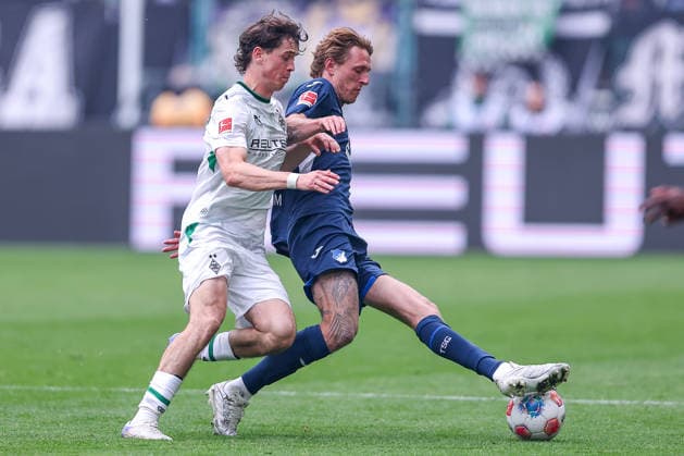 16 05 2026, Fußball, Borussia Mönchengladbach TSG 1899 Hoffenheim, 1 Fußball Bundesliga, 34 Spieltag, Borussia Park, Saison 2025 2026 Philipp Sander Borussia Mönchengladbach 16 in duel against Wouter Burger TSG Hoffenheim 18 DFB regulations prohibit any use of photographs as image sequences and or quasi video Nordrhein Westfalen Germany