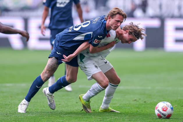 16 05 2026, Football, Borussia Mönchengladbach TSG 1899 Hoffenheim, 1 Soccer Bundesliga, 34 Matchday, Borussia Park, Season 2025 2026 Wouter Burger TSG Hoffenheim 18 in duel against Hugo Bolin Borussia Mönchengladbach 38 DFB regulations prohibit any use of photographs as image sequences and or quasi video Nordrhein Westfalen Germany