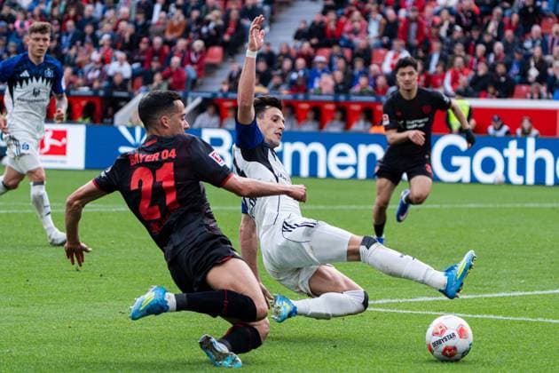 Leverkusen, Germany 16 May 2026 1 BL 2025 2026 Sp 34 Bayer 04 Leverkusen v Hamburger SV Pictured from left in duel Lucas Vazquez LEV and Nicolas Capaldo HSV DFL DFB regulations prohibit any use of photographs as image sequences and or quasi video BayArena Nordrhein Westfalen Copyright: xFotostandx xKruczynskix