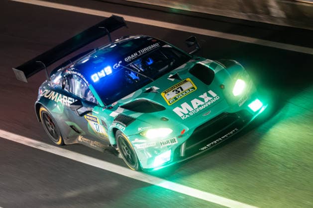 The Aston Martin Vantage AMR GT3 with the starting number 37 from the PROsport racing team with the drivers Guido Dumarey, Tobias Wahl, Markus Lönnroth and Christian Konnerth drives during the 24h race at night in the pit lane on the Grand Prix circuit of the Nürburgring Nürburg Rhineland-Palatinate Germany