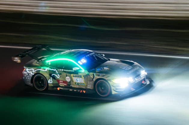 The Ford Mustang GT3 EVO 2026 with starting number 67 from the HRT Ford Racing team with drivers Frank Dennis Olsen, Christopher Mies, Frederic Vervisch and Frank Stippler drives at night on the Nürburgring Grand Prix circuit in Rhineland-Palatinate Germany during the 24-hour race.