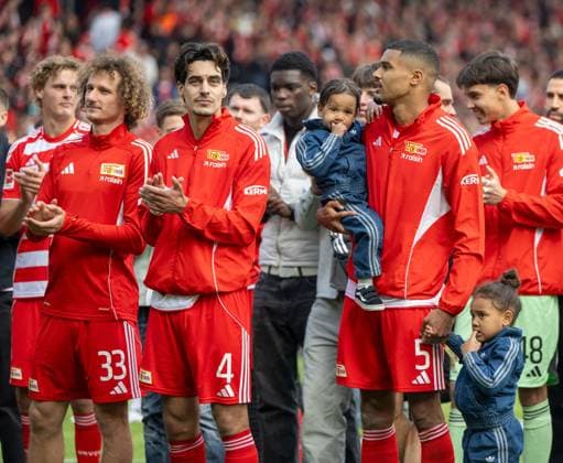 Soccer, Men, Season 2025 2026, 1 Bundesliga 34 Matchday , 1 FC Union Berlin FC Augsburg 4 0 , f l Alex Kral 1 FC Union Berlin , Diogo Leite 1 FC Union Berlin , Aljoscha Kemlein 1 FC Union Berlin , Cheering after the final whistle, 16 05 2026, Copyright: xMatthiasxKochx