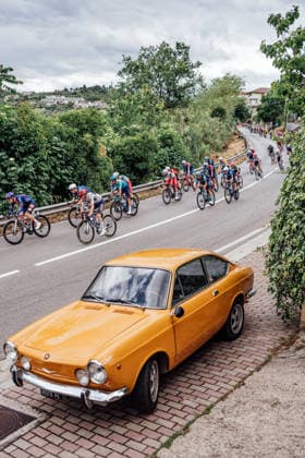 2026 Giro d Italia Stage 8 Picture by Zac Williams SWpix.com - 16 05 2026 - Cycling - 2026 Giro d Italia - Stage 8 - Chieti to Fermo - The peloton. classic car Fiat 850 Coupe Copyright: x xSWpix.comx(t axPhotographyxHubxLtd)xZacxWilliams SWpix.comx SWP-2645