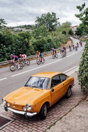 2026 Giro d Italia Stage 8 Picture by Zac Williams SWpix.com - 16 05 2026 - Cycling - 2026 Giro d Italia - Stage 8 - Chieti to Fermo - The peloton. classic car Fiat 850 Coupe Copyright: x xSWpix.comx(t axPhotographyxHubxLtd)xZacxWilliams SWpix.comx SWP-2645