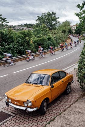 2026 Giro d Italia Stage 8 Picture by Zac Williams SWpix.com - 16 05 2026 - Cycling - 2026 Giro d Italia - Stage 8 - Chieti to Fermo - The peloton. classic car Fiat 850 Coupe Copyright: x xSWpix.comx(t axPhotographyxHubxLtd)xZacxWilliams SWpix.comx SWP-2645