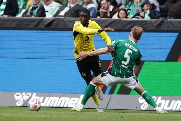 Bremen, Germany, 16 05 26, Serhou Guirassy Borussia Dortmund and Amos Pieper Werder Bremen in a duel during the match of the 1 Bundesliga between Werder Bremen Borussia Dortmund at Weserstadion in Bremen Photo by Joachim Bywaletz DFB DFL REGULATIONS PROHIBIT ANY USE OF PHOTOGRAPHS AS IMAGE SEQUENCES AND OR QUASI VIDEO Copyright: JoachimxBywaletz xJB-Sportfoto