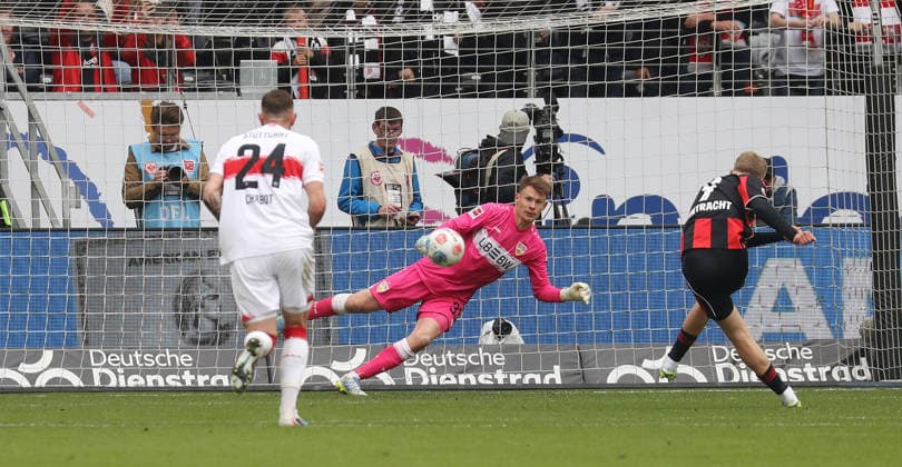 Frankfurt , Bundesliga soccer Eintracht Frankfurt vs VfB Stuttgart , Jonathan Burkardt Fra converts a penalty against Alexander Nübel VfB