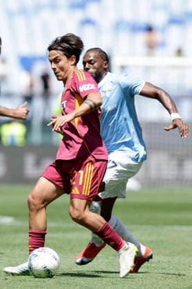 Italy: Serie a football match AS Roma vs SS Lazio Roma™s Argentinian forward Paulo Dybala challenges for the ball with lazio™s Portuguese defender Nuno Tavares during the Serie A football match between AS Roma vs SS Lazio at the Olimpico Stadium in Rome, Italy on March 17, 2026. _BPH3306 Copyright: xAntonioxBalascox