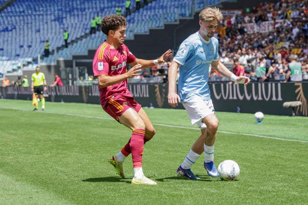 Italy: Serie a football match AS Roma vs SS Lazio Roma™s French midfielder Neil El Aynaoui challenges for the ball with lazio™s Dutch midfielder Kenneth Taylor during the Serie A football match between AS Roma vs SS Lazio at the Olimpico Stadium in Rome, Italy on March 17, 2026. ABP11760_1 Copyright: xAntonioxBalascox