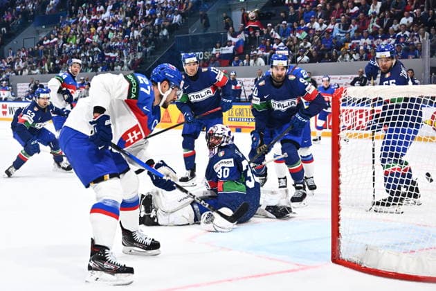 L-R scoring Marek Hrivik (SVK), goalkeeper Jacob Smith (ITA), Dylan Di Perna (ITA) and Luca Zanatta (ITA) in action during the 2026 IIHF World Championship, WM, Weltmeisterschaft Group B, match Italy vs Slovakia, on May 17, 2026, Fribourg, Switzerland. (CTKxPhoto RadekxPetrasek) CTKPhotoP2026051702949  CTKPhotoP2026051702949