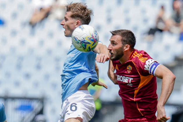 Italy: Serie a football match AS Roma vs SS Lazio lazio™s Croatian midfielder Toma Basic challenges for the ball with Roma™s Italian midfielder Bryan Cristante during the Serie A football match between AS Roma vs SS Lazio at the Olimpico Stadium in Rome, Italy on March 17, 2026. _BPH4199_1 Copyright: xAntonioxBalascox