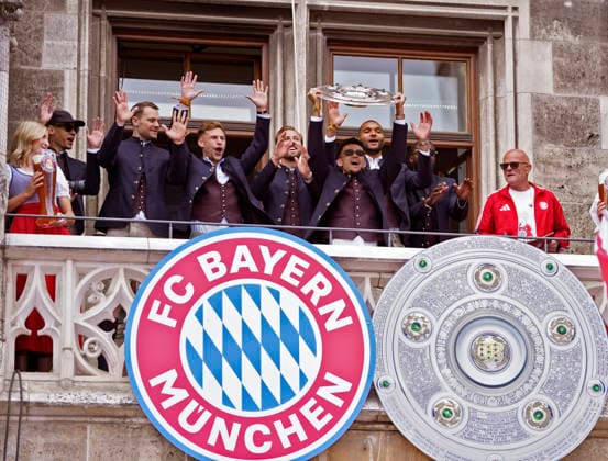 17 05 2026, Football Bundesliga 2025 2026, FC Bayern Munichs championship celebration on the balcony of the town hall in Munich from left Jamal Musiala Bayern Munich , goalkeeper Manuel Neuer FC Bayern Munich , Joshua Kimmich FC Bayern Munich , Harry Kane FC Bayern Munich , Luis Diaz FC Bayern Munich , Jonathan Tah FC Bayern Munich , Dayot Upamecano FC Bayern Munich , with the championship trophy