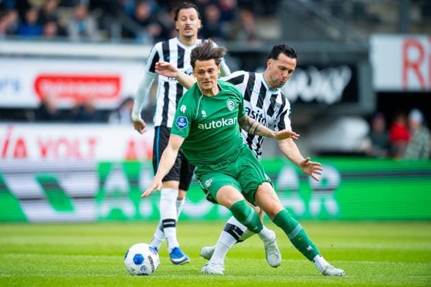 ALMELO , 17 05-2026 , Stadium Asito , season 2025 2026 , Dutch Eredivisie football , match between Heracles Almelo and FC Groningen , picture shows FC Groningen player Tika de Jonge Heracles Almelo player Thomas Bruns Heracles - Groningen  x203757454x Copyright:
