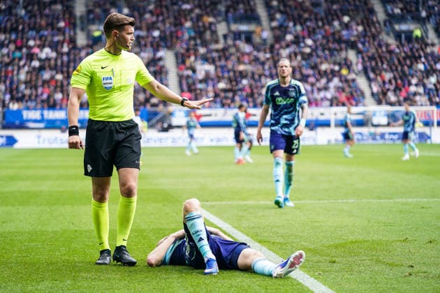 2026-05-17 SC Heerenveen v AFC Ajax - Dutch Vriendenloterij Eredivisie HEERENVEEN, NETHERLANDS - MAY 17: Referee Joey Kooij, Anton Gaaei of Ajax during the Dutch Vriendenloterij Eredivisie match between SC Heerenveen and AFC Ajax at Abe Lenstra Stadion on May 17, 2026 in Heerenveen, Netherlands. Heerenveen Abe Lenstra Stadion Netherlands Content not available for redistribution in The Netherlands directly or indirectly through any third parties. Copyright: xAndrexWeeningx