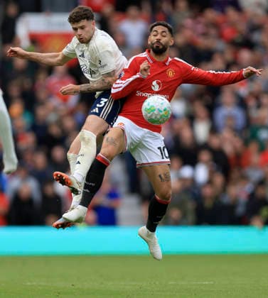 Manchester United, ManU v Nottingham Forest - Premier League Neco Williams of Nottingham Forest and Matheus Cunha of Manchester United challenge during the Premier League match between Manchester United and Nottingham Forest at Old Trafford on May 17, 2026 in Manchester, England. WARNING! This Photograph May Only Be Used For Newspaper And Or Magazine Editorial Purposes. May Not Be Used For Publications Involving 1 player, 1 Club Or 1 Competition Without Written Authorisation From Football DataCo Ltd. For Any Queries, Please Contact Football DataCo Ltd on +44 (0) 207 864 9121 Manchester Old Trafford England United Kingdom Copyright: xAllstarxPicturexLibraryxLtdx