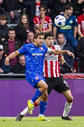 EINDHOVEN , 17-05-2026 , Philips stadium , season 2025 2026 , Dutch Eredivisie football , match between PSV and FC Twente , picture shows Twente player Bart van Rooij , PSV player Ricardo Pepi PSV - Twente  x203758798x Copyright:
