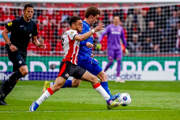 Daan Rots of FC Twente and Sergino Dest of PSV Eindhoven battle for the ball PSV Eindhoven v FC Twente, Eredivisie, PSV v FC Twente 65, Philips Stadion, May 17, 2026, Eindhoven, Netherlands.