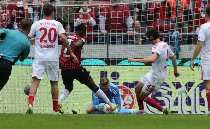 17 05 2026 Soccer Season 2024 2025 2 Soccer Bundesliga 34 Matchday Hannover 96 H96 1 FC Nuremberg FCN Club Sportfoto Zink DaMa xdaxmax DFL regulations prohibit any use of photographs as image sequences and or quasi video only for editorial use Jan Reichert 1, 1 FC Nuremberg FCN clears in front of Mustapha Bundu 7, Hannover 96 H96