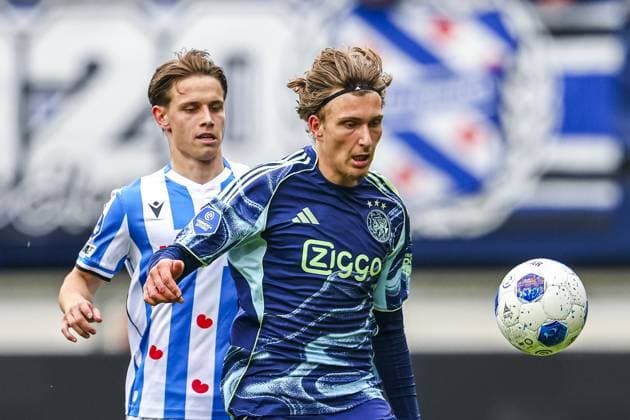 HEERENVEEN , 17-05-2026 , Abe Lenstra Stadium , season 2025 2026 , Dutch Eredivisie football , match between SC Heerenveen - Ajax , picture shows SC Heerenveen player Oliver Braude and Ajax player Mika Godts Heerenveen - Ajax  x203759273x Copyright:
