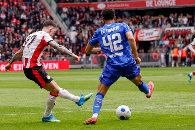 2026-05-17 PSV v FC Twente - Dutch Eredivisie EINDHOVEN, NETHERLANDS - MAY 17: Dennis Man of PSV scoring his teams third goal, Daouda Weidmann of sc Heerenveen during the Dutch Eredivisie match between PSV and FC Twente at Philips Stadion on May 17, 2026 in Eindhoven, Netherlands. Eindhoven Philips Stadion Netherlands Content not available for redistribution in The Netherlands directly or indirectly through any third parties. Copyright: xBenxGalx
