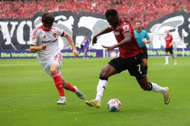 17 05 2026, xtgx, Fußball 2 Bundesliga, Hannover 96 1 FC Nürnberg v l Fabio Gruber 1 FC Nuernberg Mustapha Bundu Hannover 96 Zweikampf, Aktion, action, battle for the ball DFL DFB REGULATIONS PROHIBIT ANY USE OF PHOTOGRAPHS as IMAGE SEQUENCES and or QUASI VIDEO Hannover