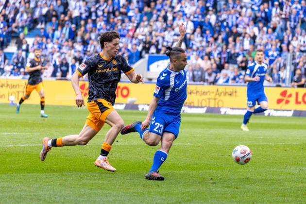 Germany 2 Bundesliga, Matchday 34, Season 2025 2026, 1 FC Magdeburg vs 1 FC Kaiserslautern Avnet Arena Magdeburg Atik Baris 1 FC Magdeburg, 23 in duel against Robinson Leon 1 FC Kaiserslautern, 37 Copyright: xMichellexLukax
