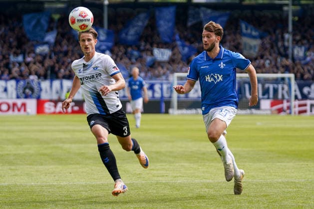 Germany Soccer 2 Liga 2025 2026, Matchday 34 SV Darmstadt 98 vs SC Paderborn 07 Merck Stadion am Böllenfalltor Darmstadt Killian Corredor SVD, 34 in duel with Jonah Sticker SCP, 3 Copyright: xTobiasxWentzellx