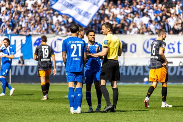 Germany 2 Bundesliga, Matchday 34, Season 2025 2026, 1 FC Magdeburg vs 1 FC Kaiserslautern Avnet Arena Magdeburg Dr Max Burda Referee , Michel Falko 1 FC Magdeburg, 21 , Bockhorn Herbert 1 FC Magdeburg, 7 , Atik Baris 1 FC Magdeburg, 23 Copyright: xMichellexLukax