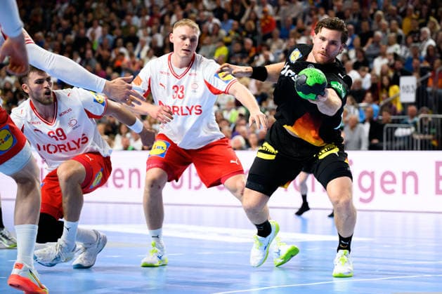 Koeln Handball Laenderspiel Deutschland Daenemark f li Daenemarks Steven Jacobsen, Daenemarks Emil Bergholt, Johannes Golla Germany Koeln Lanxess Arena Germany