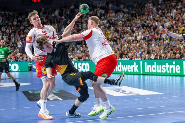 17 05 2026, xkwix, Handball, international match, Germany Denmark , Lanxess Arena in Cologne Nils Lichtlein Germany 03 throwing and tackling Niclas Vest Kirkelokke Denmark 3 and Lasse Andersson Denmark 28 Photo xKamilxWilkowskixPressefotoKochx Nordrhein Westfalen Germany