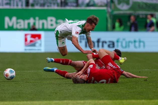 Yellow card for Sotiris Alexandropoulos 14 Fortuna Duesseldorf after this foul on Felix Klaus 30 Spvgg Greuther Fuerth , Action, with Christopher Lenz 3 Fortuna Duesseldorf , SpVgg Greuther Fuerth vs Fortuna Duesseldorf, Football, Men, 2 Bundesliga, DFL, Season 2025 2026, 34 Matchday, Second round, 17 05 2026 DFB regulations prohibit any use of photographs as image sequences and or quasi video Fuerth Bayern Germany Copyright: xkolbert-press MartinxAgüerax