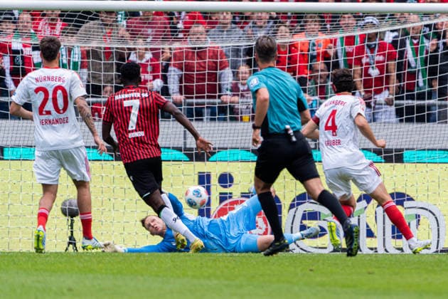 Hannover, Germany 17 May 2026 2 BL 2025 2026 Sp 34 Hannover 96 v 1 FC Nürnberg Pictured from left in duel Mustapha Bundu HAN and goalkeeper Jan Reichert FCN DFL DFB regulations prohibit any use of photographs as image sequences and or quasi video Heinz von Heiden Arena Niedersachsen Copyright: xFotostandx xKruczynskix