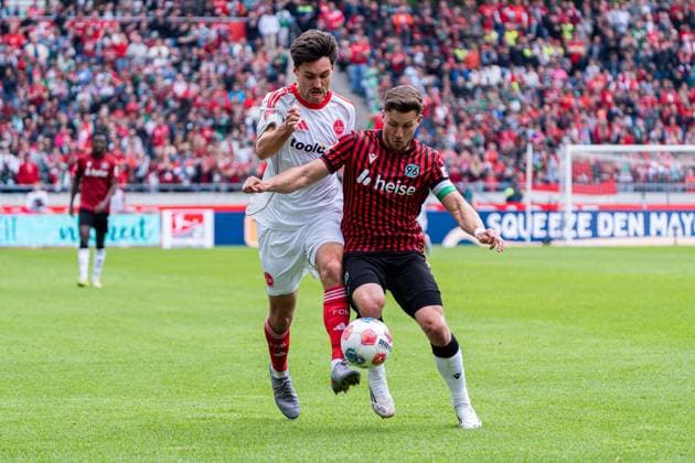 Hannover, Germany 17 May 2026 2 BL 2025 2026 Sp 34 Hannover 96 v 1 FC Nürnberg Pictured from left in duel Tom Baack FCN and Enzo Leopold HAN DFL DFB regulations prohibit any use of photographs as image sequences and or quasi video Heinz von Heiden Arena Niedersachsen Copyright: xFotostandx xKruczynskix