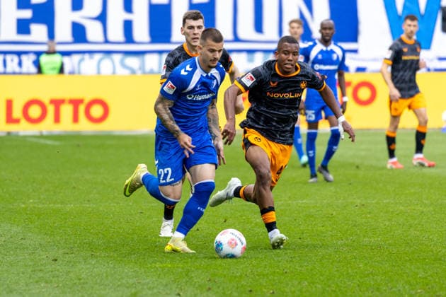 Germany 2 Bundesliga, Matchday 34, Season 2025 2026, 1 FC Magdeburg vs 1 FC Kaiserslautern Avnet Arena Magdeburg Schramm David 1 FC Kaiserslautern, 41 in duel against Zukowski Mateusz 1 FC Magdeburg, 22 Copyright: xMichellexLukax