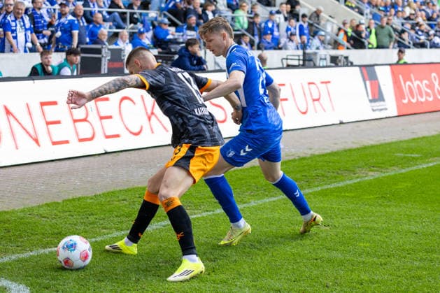 Germany 2 Bundesliga, Matchday 34, Season 2025 2026, 1 FC Magdeburg vs 1 FC Kaiserslautern Avnet Arena Magdeburg Wekesser Erik 1 FC Kaiserslautern, 13 in duel against Hercher Philipp 1 FC Magdeburg, 27 Copyright: xMichellexLukax