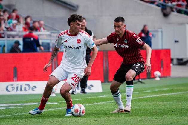2 Bundesliga Hannover 96 vs 1 FC Nürnberg, 17 05 2026 Javier Fernandez 1 FC Nürnberg, 20 vs Bastian Allgeier Hannover 96, 17 Football, 2 Bundesliga, 34 Matchday Hannover 96 vs 1 FC Nürnberg on 17 05 2026 at Heinz von Heiden Arena, Hannover DFL REGULATIONS PROHIBIT ANY USE OF PHOTOGRAPHS AS IMAGE SEQUENCES AND OR QUASI VIDEO Copyright: xBEAUTIFULxSPORTS Tonhäuserx