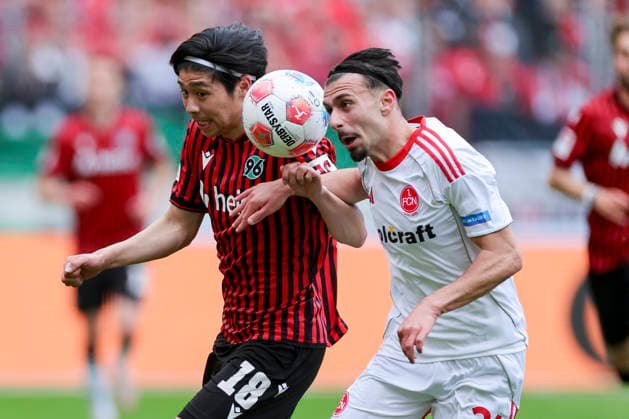 Daisuke Yokota Hannover 96 and Berkay Yilmaz 1 FC Nuernberg battle for the ball, 2 Bundesliga, Hannover 96 v 1 FC Nuernberg, Heinz von Heiden Arena on May 17, 2026 in Hanover, Germany Photo by Marco Steinbrenner DeFodi Images Daisuke Yokota Hannover 96 and Berkay Yilmaz 1 FC Nuernberg battle for the ball, 2 Bundesliga, Hannover 96 v 1 FC Nuernberg, Heinz von Heiden Arena, May 17, 2026 in Hanover, Germany Photo by Marco Steinbrenner DeFodi Images