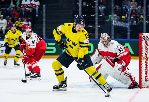 260517 Jack Berglund of Sweden and goaltender Mads Sogaard of Denmark during the 2026 IIHF Ice Hockey World Championship match between Denmark and Sweden on May 17, 2026 in Fribourg Photo Jesper Zerman BILDBYRAN kod JZ JZ0716 ishockey ice hockey ishockey vm 2026 vm 2026 iihf world championship danmark denmark sverige sweden bbeng  Copyright: JESPERxZERMAN BB260517JZ044