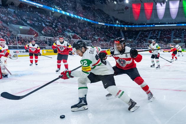 ZURICH, SWITZERLAND - MAY 17: Bernd Wolf (Austria, 32) in the battle for the puck with Vilmos Gallo (Hungary, 22) during the Preliminary Round - Group A Match 13 between Austria and Hungary at the IIHF Ice hockey, Eishockey World Championship, WM, Weltmeisterschaft 2026, Swiss Life Arena on May 17, 2026 in Zurich, Switzerland. Zurich Switzerland Copyright: xTimoxSteinx