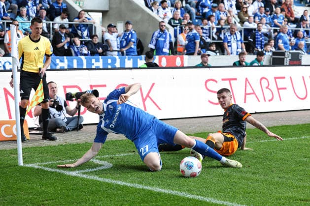 Philipp Hercher 1 FC Magdeburg,27 vs Erik Wekesser 1 FC Kaiserslautern,13 2 Soccer Bundesliga Season 2025 2026 1 FC Magdeburg vs 1 FC Kaiserslautern at the Avnet Arena in Magdeburg Action,Soccer,Man,Men,Germany,17 05 2026