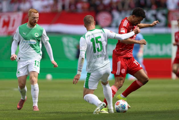 Jan Elvedi SpVgg Greuther Fürth and Emmanuel Iyoha Fortuna Düsseldorf in a duel during the 2 Bundesliga match between SpVgg Greuther Fürth and Fortuna Düsseldorf, Sportpark Ronhof Thomas Sommer on May 17, 2026 in Fürth, Germany Photo by Oliver Kaelke DeFodi Images Jan Elvedi SpVgg Greuther Fürth and Emmanuel Iyoha Fortuna Düsseldorf battle for the ball during the 2 Bundesliga match between SpVgg Greuther Fürth and Fortuna Düsseldorf at Sportpark Ronhof Thomas Sommer on May 17, 2026 in Fürth, Germany Photo by Oliver Kaelke DeFodi Images Photo by Oliver Kaelke DeFodi Images