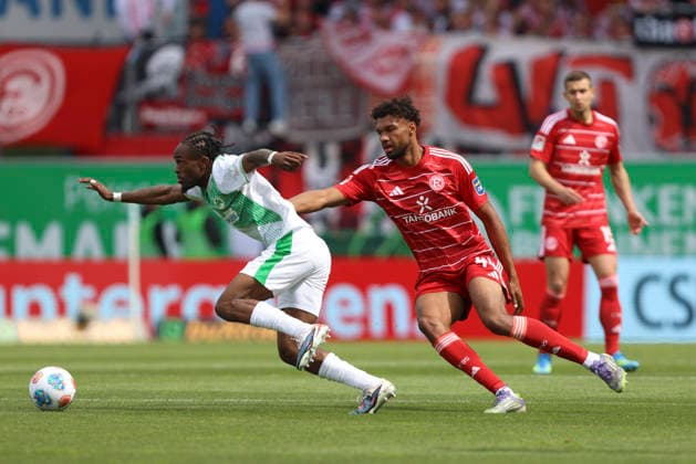 Noel Futkeu SpVgg Greuther Fürth and Elias Egouli Fortuna Düsseldorf in a duel during the 2 Bundesliga match between SpVgg Greuther Fürth and Fortuna Düsseldorf, Sportpark Ronhof Thomas Sommer on May 17, 2026 in Fürth, Germany Photo by Oliver Kaelke DeFodi Images Noel Futkeu SpVgg Greuther Fürth and Elias Egouli Fortuna Düsseldorf battle for the ball during the 2 Bundesliga match between SpVgg Greuther Fürth and Fortuna Düsseldorf at Sportpark Ronhof Thomas Sommer on May 17, 2026 in Fürth, Germany Photo by Oliver Kaelke DeFodi Images Photo by Oliver Kaelke DeFodi Images