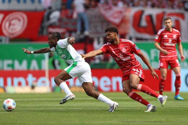 Noel Futkeu SpVgg Greuther Fürth and Elias Egouli Fortuna Düsseldorf in a duel during the 2 Bundesliga match between SpVgg Greuther Fürth and Fortuna Düsseldorf, Sportpark Ronhof Thomas Sommer on May 17, 2026 in Fürth, Germany Photo by Oliver Kaelke DeFodi Images Noel Futkeu SpVgg Greuther Fürth and Elias Egouli Fortuna Düsseldorf battle for the ball during the 2 Bundesliga match between SpVgg Greuther Fürth and Fortuna Düsseldorf at Sportpark Ronhof Thomas Sommer on May 17, 2026 in Fürth, Germany Photo by Oliver Kaelke DeFodi Images Photo by Oliver Kaelke DeFodi Images