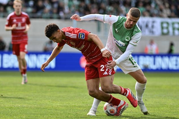 FUERTH, GERMANY - 17. MAI: tackle between Jordi Leander PAULINA (Fortuna Düsseldorf 27) and Jan ELVEDI (SpVgg Greuther Fuehrt 15) during the 2. Bundesliga Match between SpVgg Greuther Fuehrt vs. Fortuna Duesseldorf at Matchday 34 at Sportpark Ronhof Thomas Sommer DFL REGULATIONS PROHIBIT ANY USE OF PHOTOGRAPHS AS IMAGE SEQUENCES AND OR QUASI-VIDEO Copyright: xBEAUTIFULxSPORTS Goldbergx