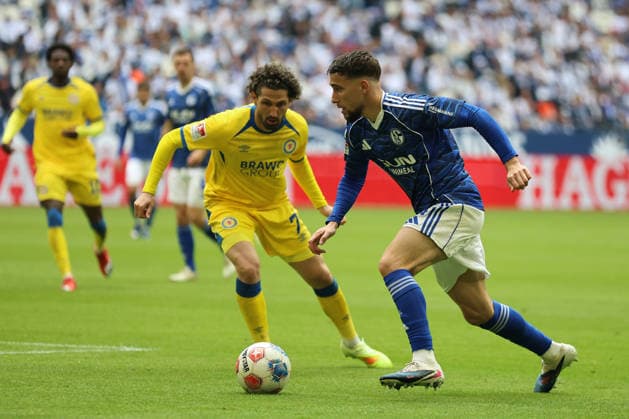 Fabio Kaufmann Eintracht Braunschweig and Adil Aouchiche FC Schalke 04 at the match of the 2 Bundesliga season 2025 26 FC Schalke 04 Eintracht Braunschweig Copyright Thomas Pakusch Copyright: Thomas Pakusch