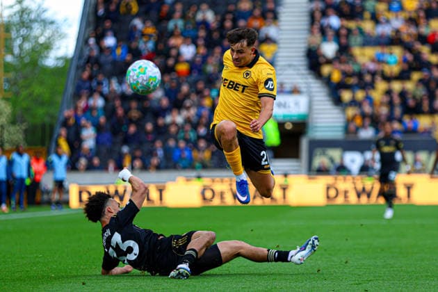 WOLVERHAMPTON, ENGLAND - May 17: Rodrigo Gomes of Wolves jumps over Antonee Robinson of Fulham during the Premier League football match between Wolverhampton Wanderers and Fulham at Molineux stadium, May 17 in Wolverhampton, England Copyright: xNataliexMincher SPPx Sportspressphoto_SPR148761